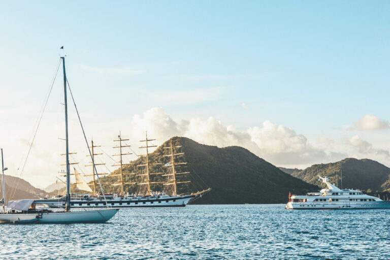 Yachts anchored at the Rodney bay with big naval clipper, Rodney bay, Saint Lucia, Caribbean sea